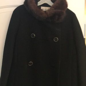 Black vintage all wool coat with fox collar.
